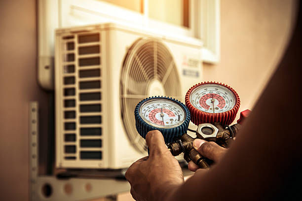 Professional Heat Pump Repair technician working in Washington, MI
